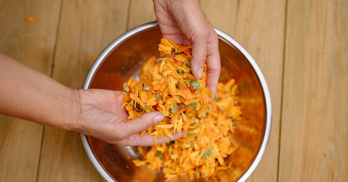 What methods are appropriate for preparing a 'chow chow' (chayote)? - Person Holding Stainless Steel Bowl With Yellow Pasta