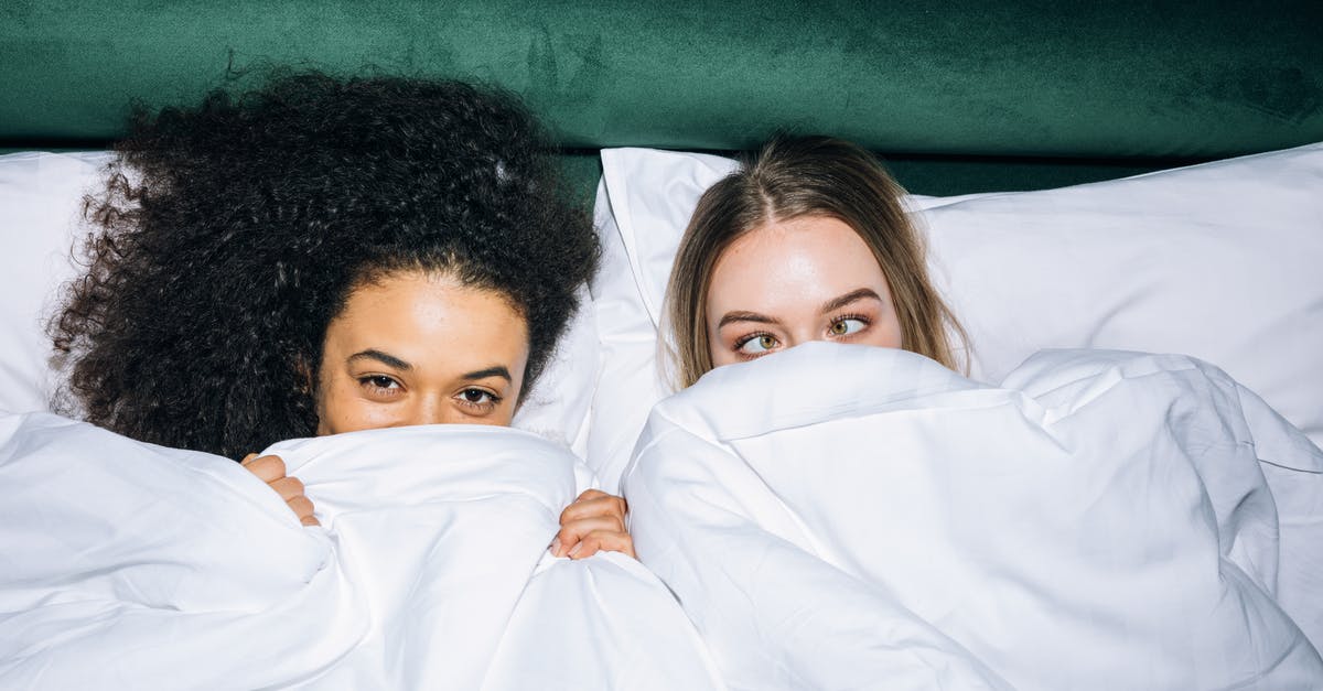 What parameter is best to increase - time or temperature? - Two Young Girls Lying on White Bed