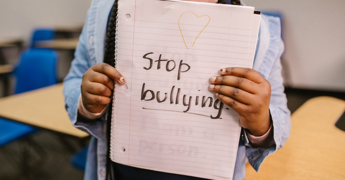 What properties allow something to be considered "milk"? - Child Showing a Message Written in a Notebook