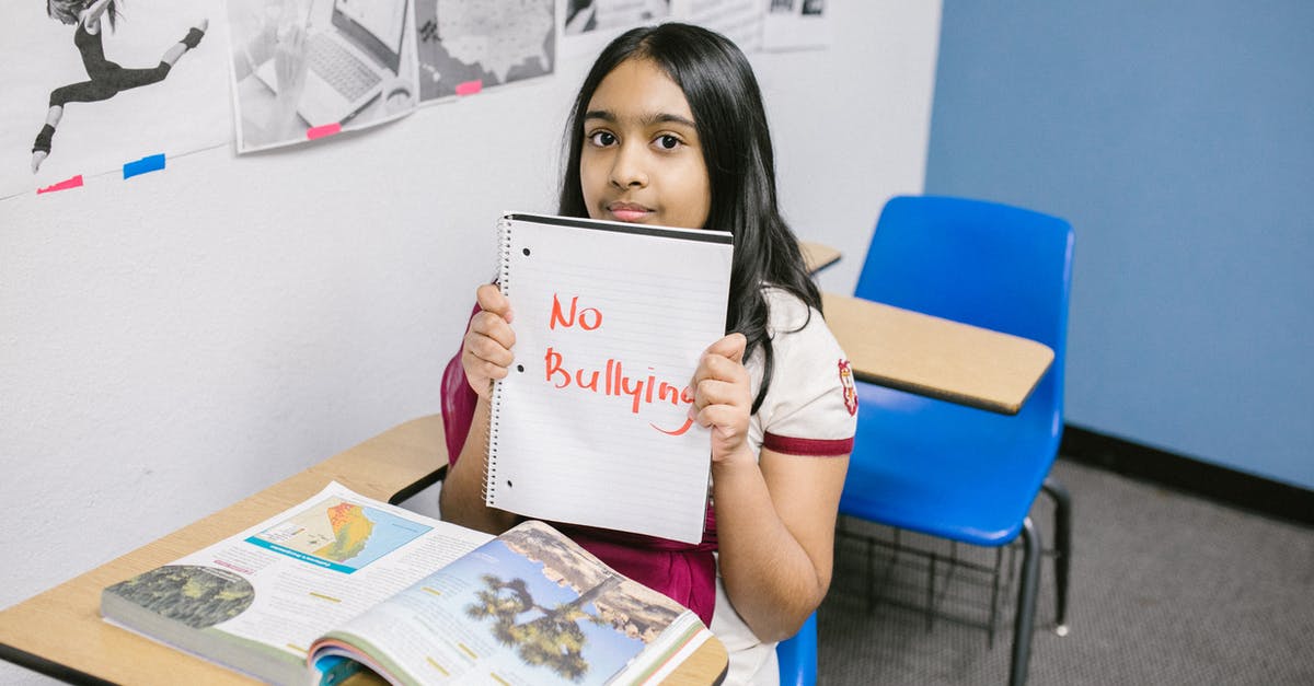 What properties allow something to be considered "milk"? - Girl Showing a Message Written in a Notebook