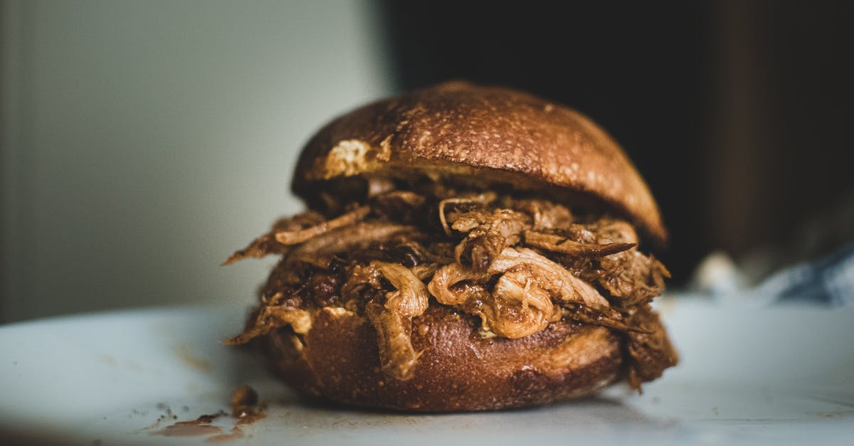 What Sampling Bread to use for Pulled Pork, open faced? [closed] - Brown Bread on White Ceramic Plate