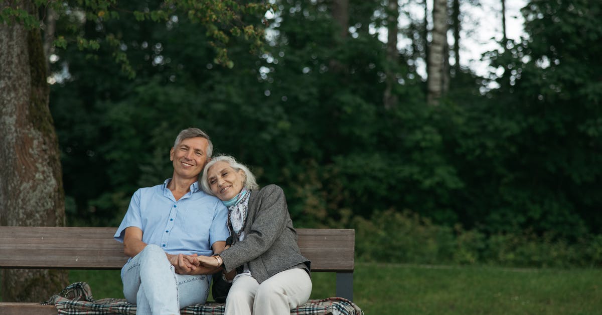 What should I do with my leftover bench flour? - Couple Sitting on Brown Wooden Bench