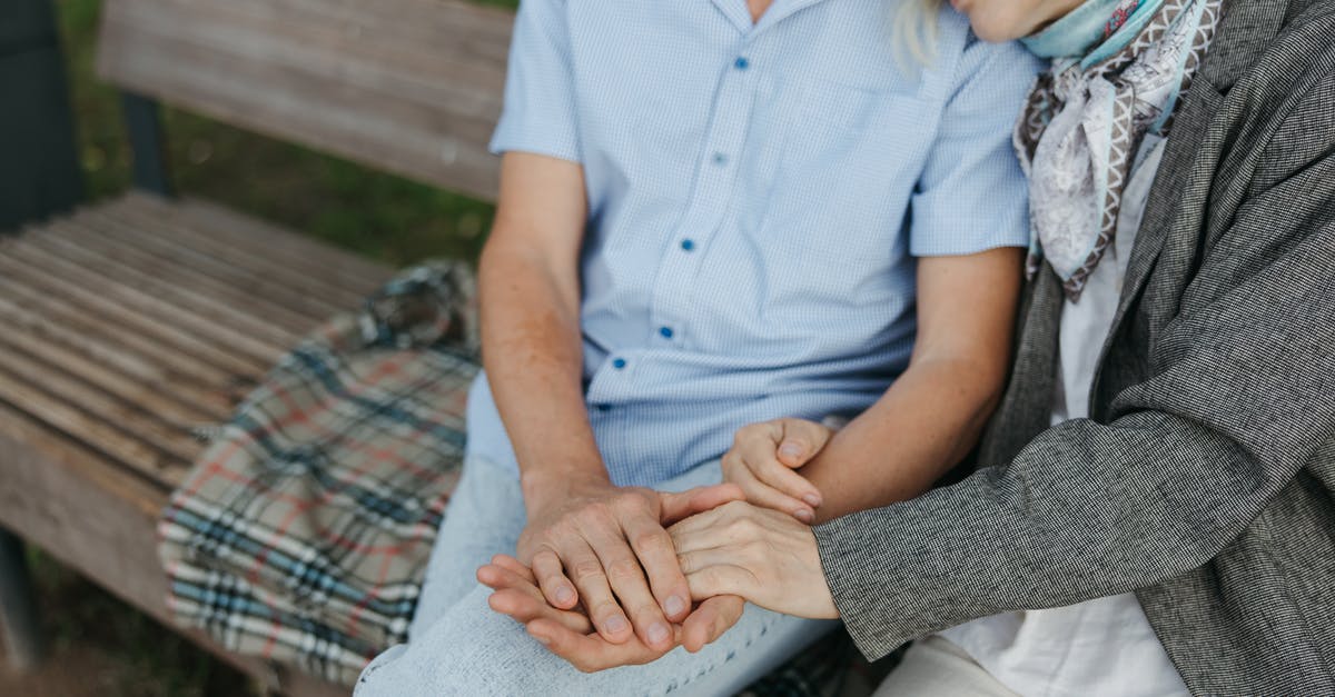 What should I do with my leftover bench flour? - Man in Blue Button Up Shirt Sitting Beside Woman in Gray and White Dress