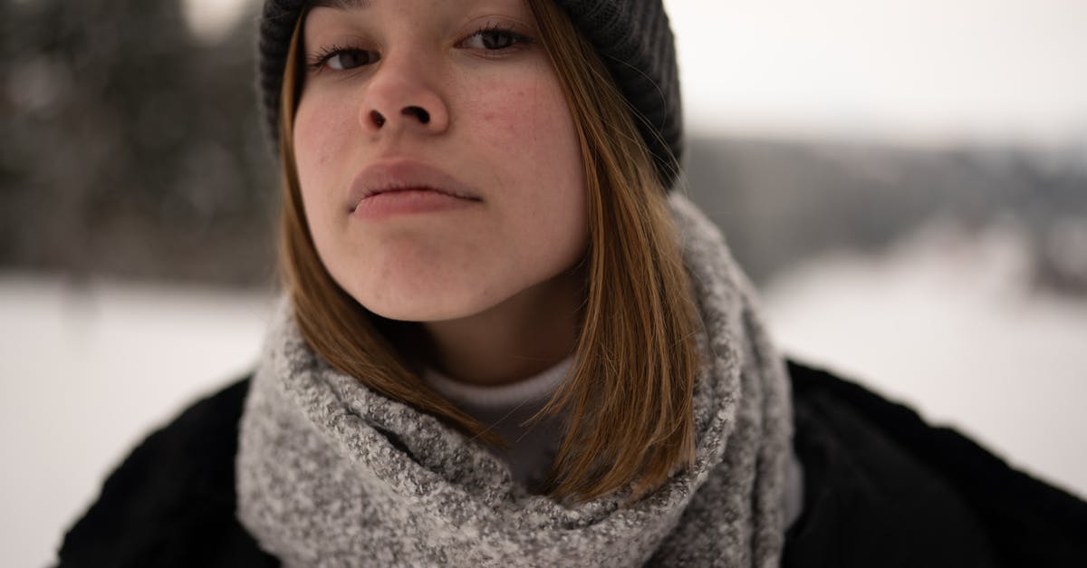 What should I look for in a crepe pan? - Woman in Black Knit Cap and Gray Scarf