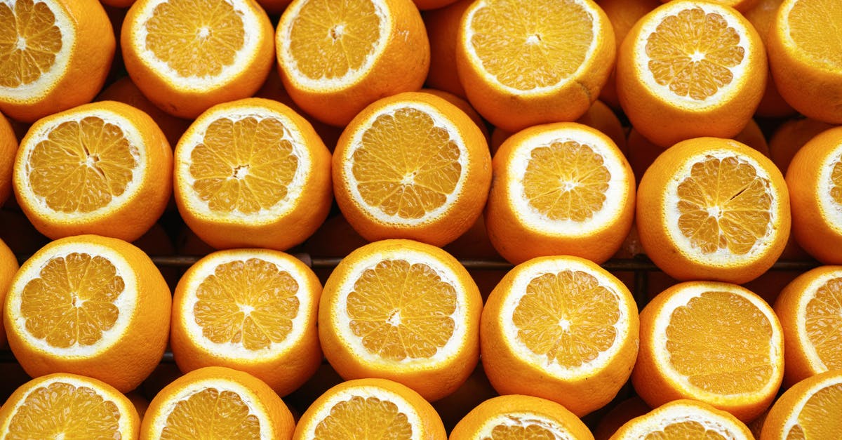 What squeezes out juice better, auger or press? - Sliced Oranges