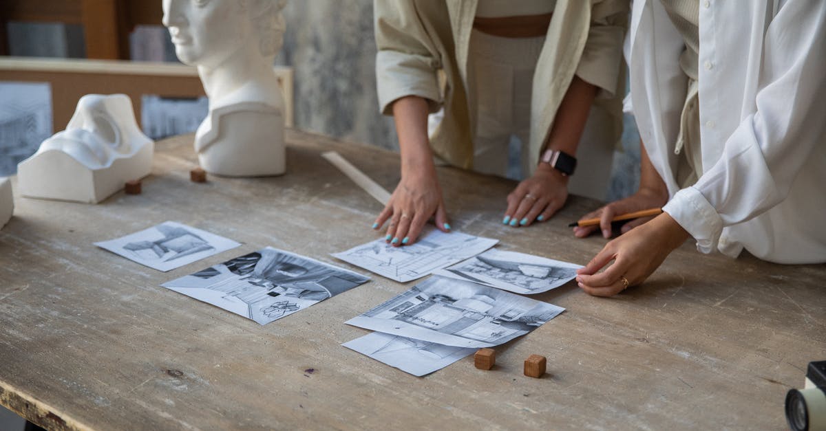 What the heck is on this cast iron, and HOW TO REMOVE? - Person in White Button Up Shirt Sitting at Table With Newspaper What the heck is on this cast iron, and HOW TO REMOVE? - Person in White Button Up Shirt Sitting at Table With Newspaper