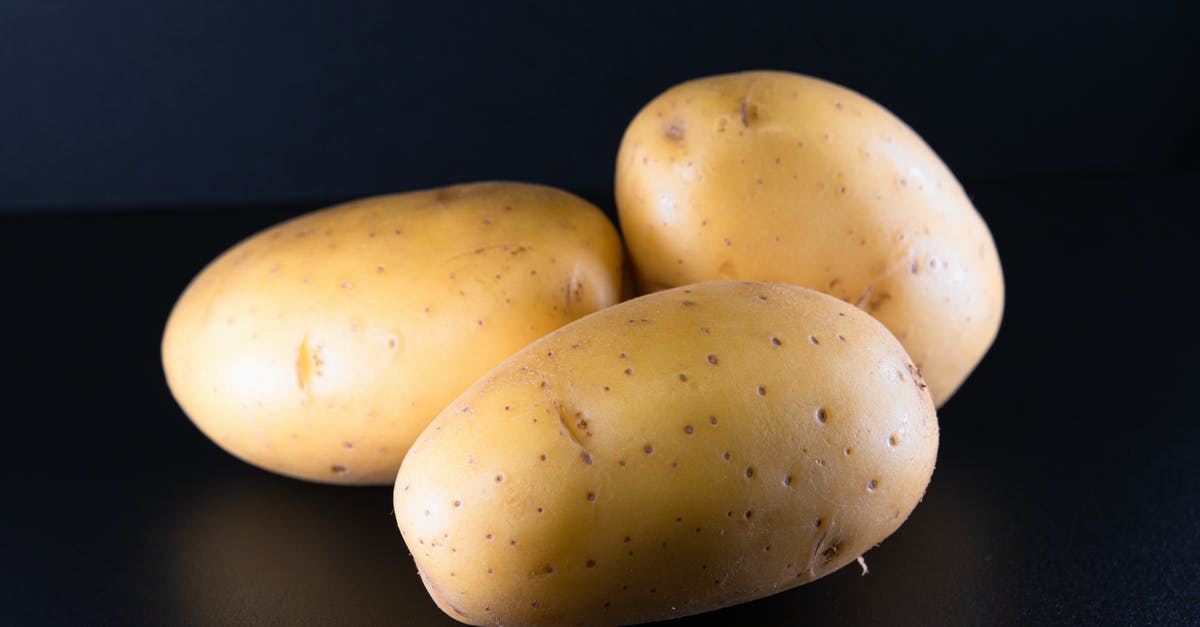 What to do with dehydrated potatoes tainted black? - Close up of Potatoes on a Black Surface