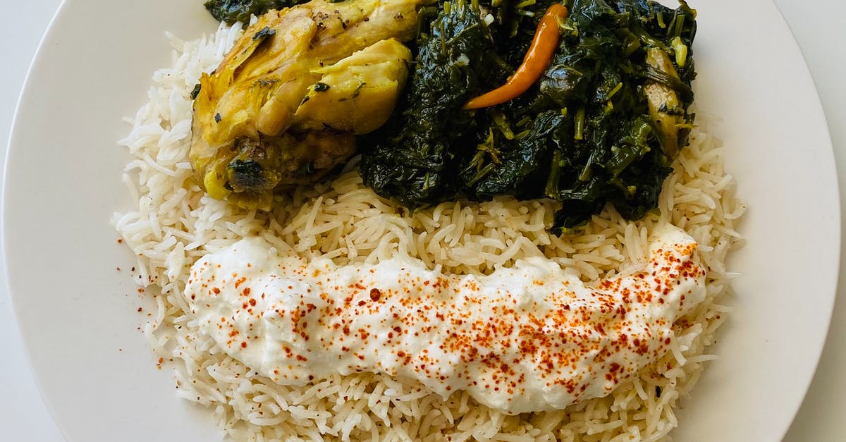 What types of rice are appropriate to use in a rice cooker? - Plate of White Rice with Chicken and Vegetable