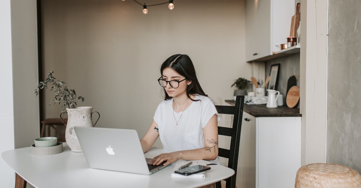 What was wrong with using White Truffle Oil? - Focused young businesswoman using laptop at home