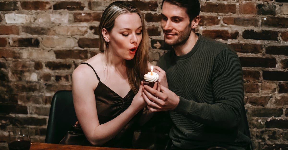 What wine(s) would you substitute for sweet red vermouth? - Couple blows in candle on birthday dessert