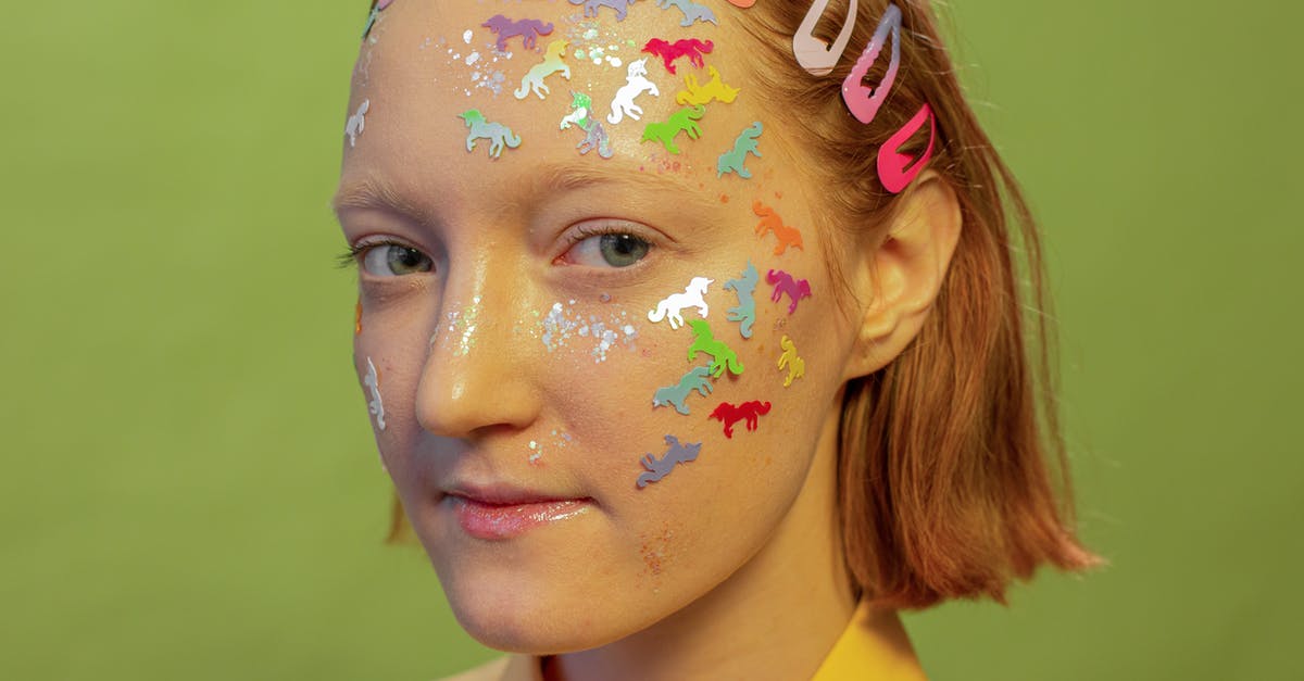 Whats causing odd flavour in reheated chicken? - Crop woman with multicolored stickers on face in photo studio