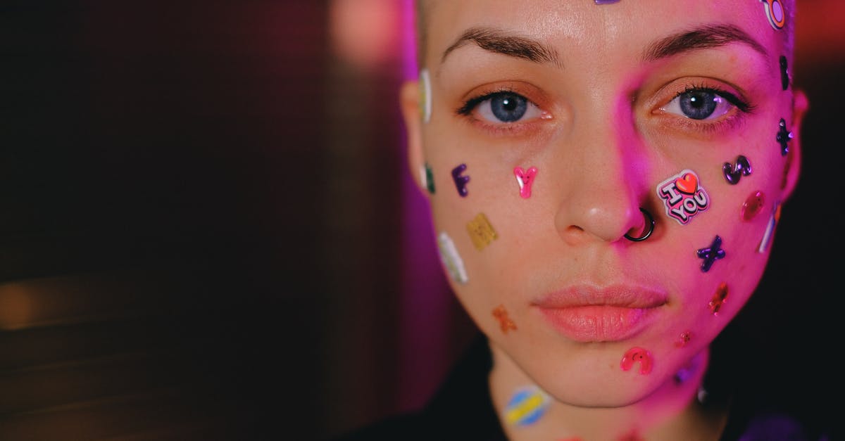 Whats causing odd flavour in reheated chicken? - Crop unemotional woman with stickers on face in dark studio