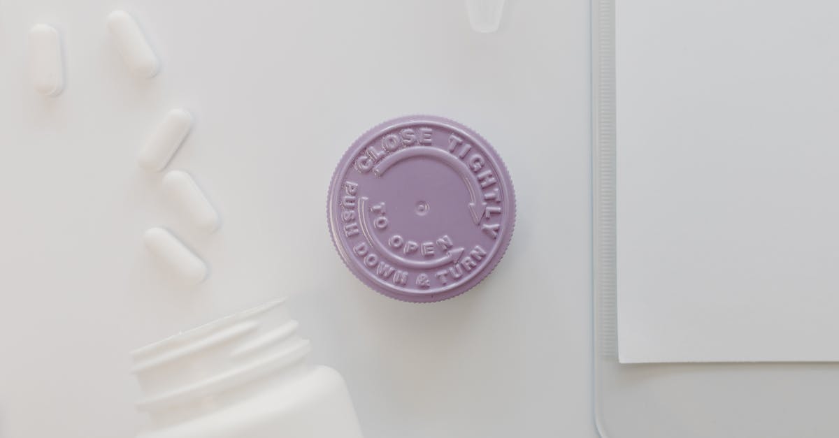 When do you hear the Ping sound of the lid sealing? - Whiite Plastic Medicine Bottle With Purple Cover