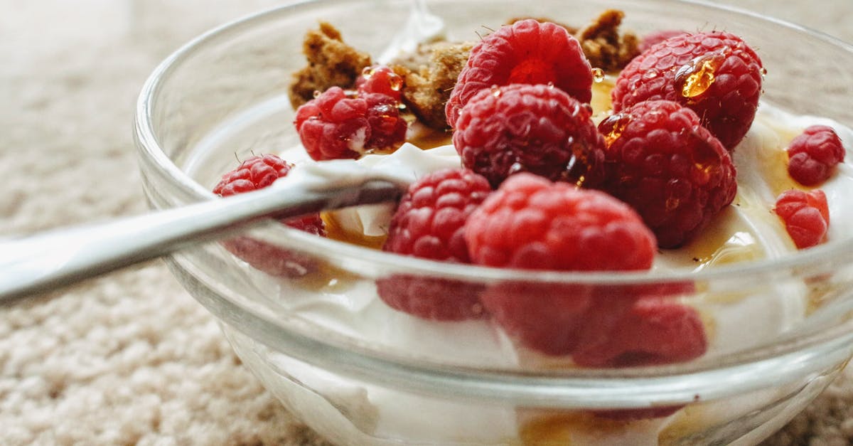 When should I add fresh fruits in homemade yogurt? - Red Raspberry on Clear Glass Bowl