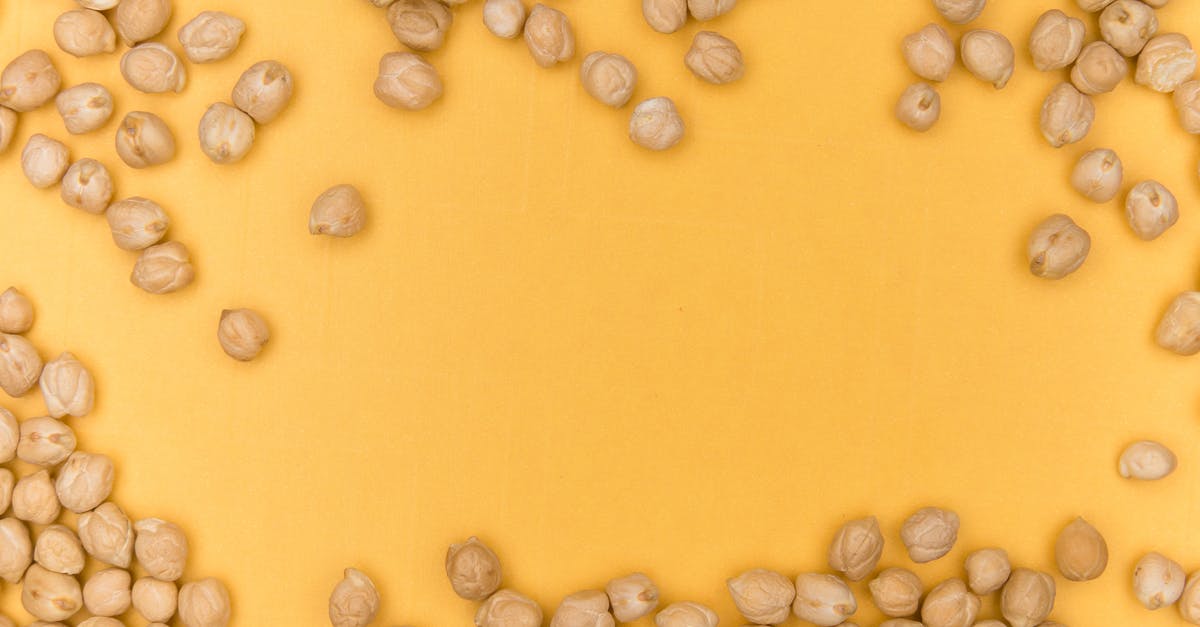 When soaking chickpeas (garbanzo beans), do I discard floaters? - Chickpeas on a Yellow Background