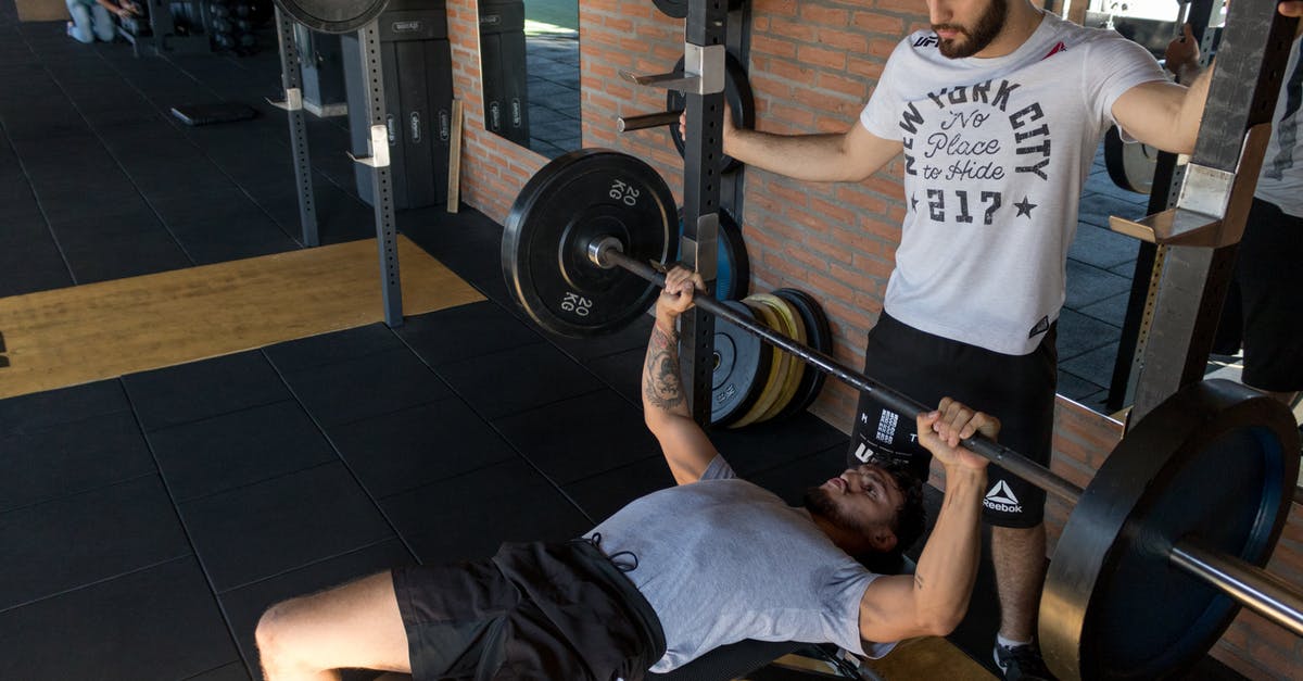 Where do I get weights for a Dutch-style cheese press? - Man Lying While Doing Barbell