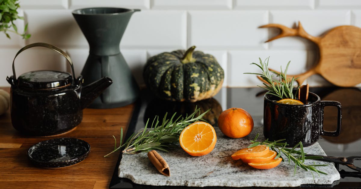 Where in Pakistan can I buy a kettle BBQ? - Orange Fruits on Brown Wooden Chopping Board