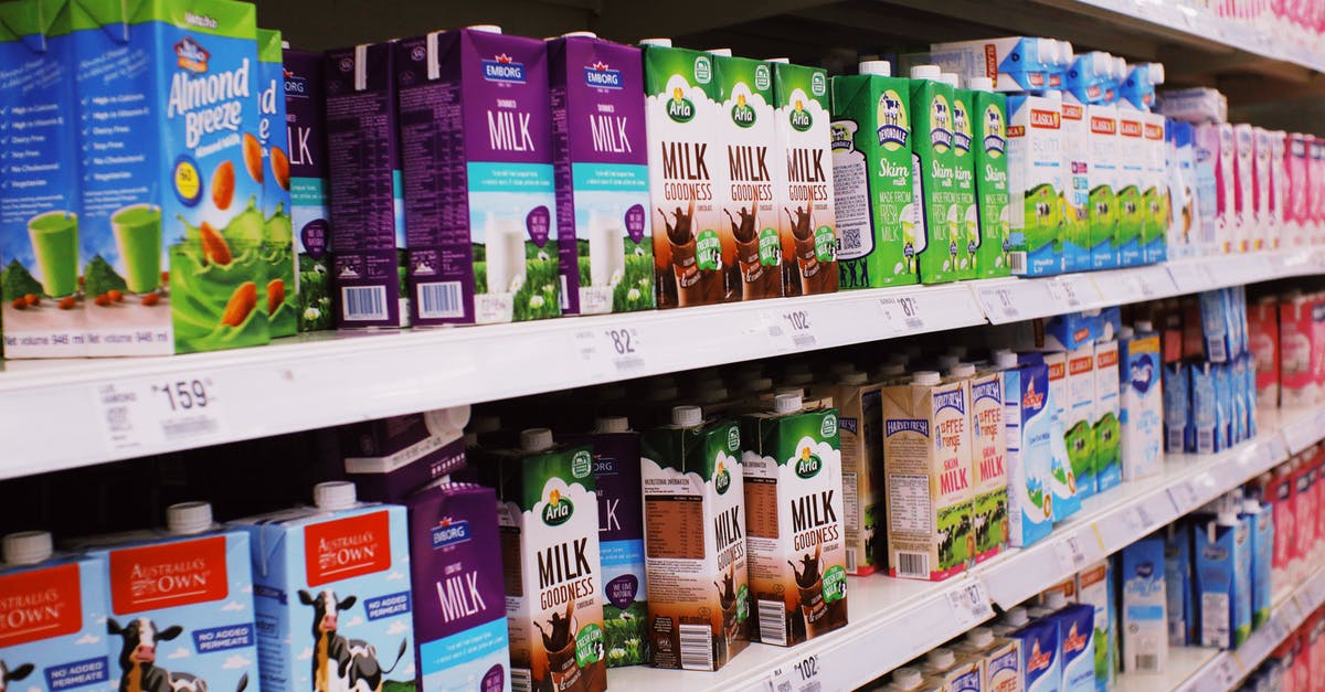 Where is a good place to buy food coloring in bulk? - Shelves with various milk boxes