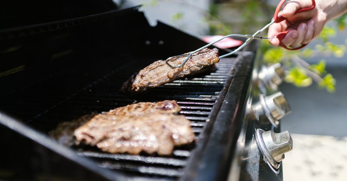 Where to locate thermometer in my Weber charcoal grill - Grilled Meat on Black Grill