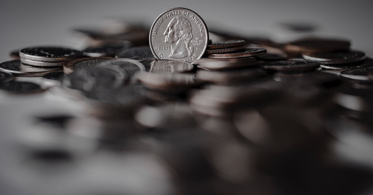 Whey separation making yoghurt: change in proportions - Silver Round Coins on Brown Wooden Surface