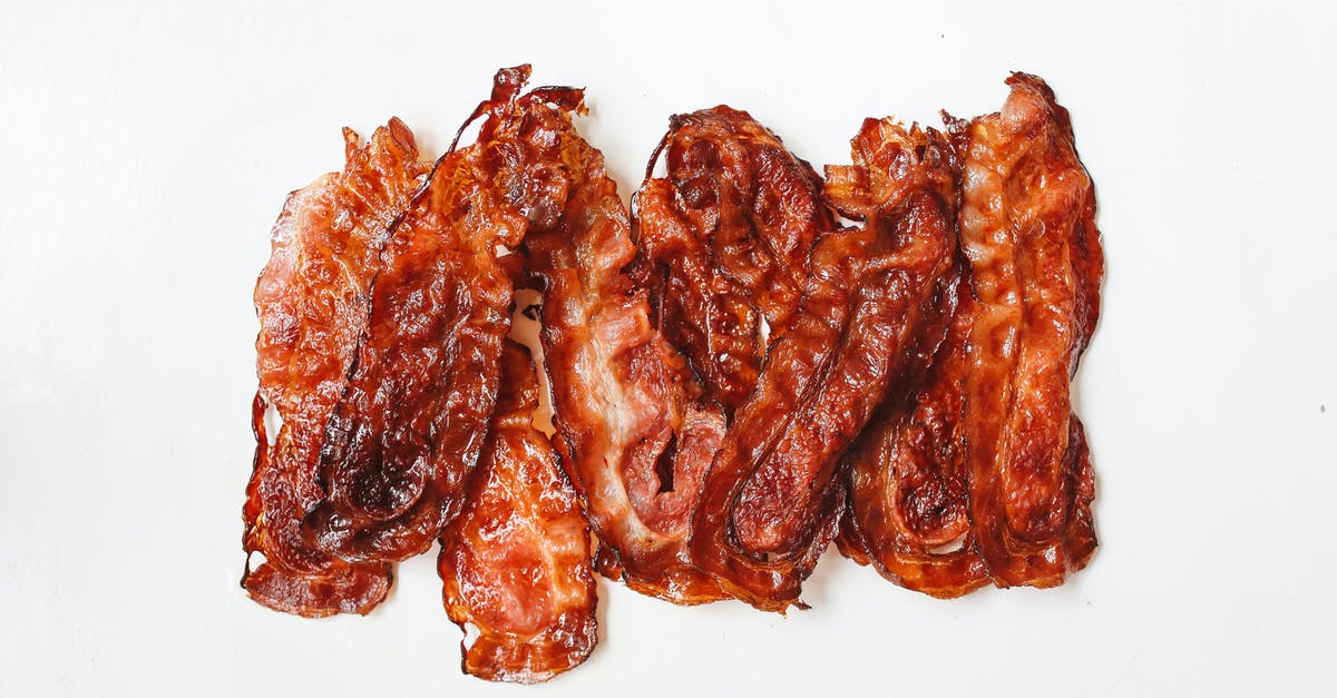 Which cooking method gives the leanest bacon? - Fried Strips Of Meat On White Surface
