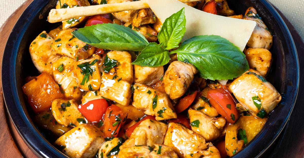 Which cooking methods do not cause meat to fry in oil\their own oil? - Cooked Food on Black Ceramic Bowl Which cooking methods do not cause meat to fry in oil\their own oil? - Cooked Food on Black Ceramic Bowl