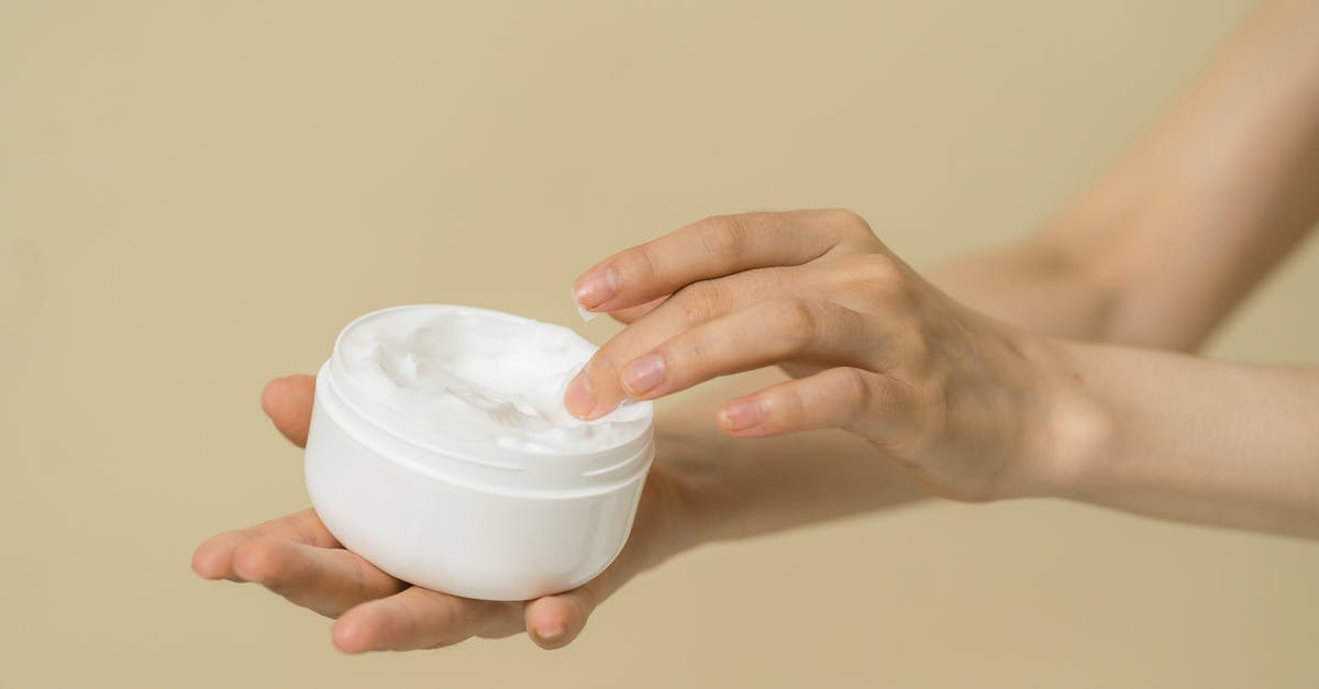Which kind of cream do I use for creme brulee? - Woman taking cosmetic product from container