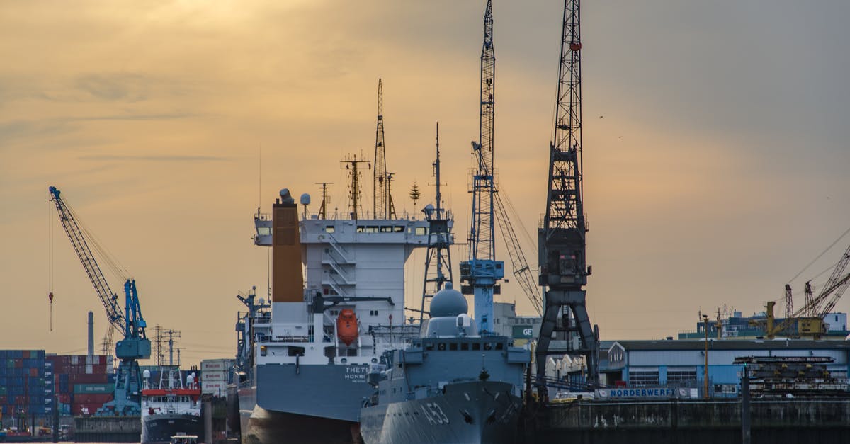 Which kinds of vessels insulate well? - Shipping Boat Near Dock