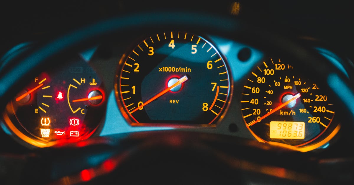 Which measuring scale should I buy? - Closeup of tachometer near speedometer and oil pressure gauge on colorful dashboard in modern car