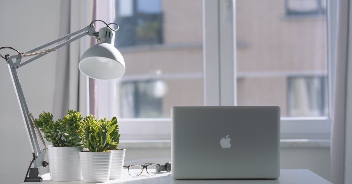 White stuff on the top of my apple cider vinegar? - Silver Macbook Air and Goose Neck Lamp