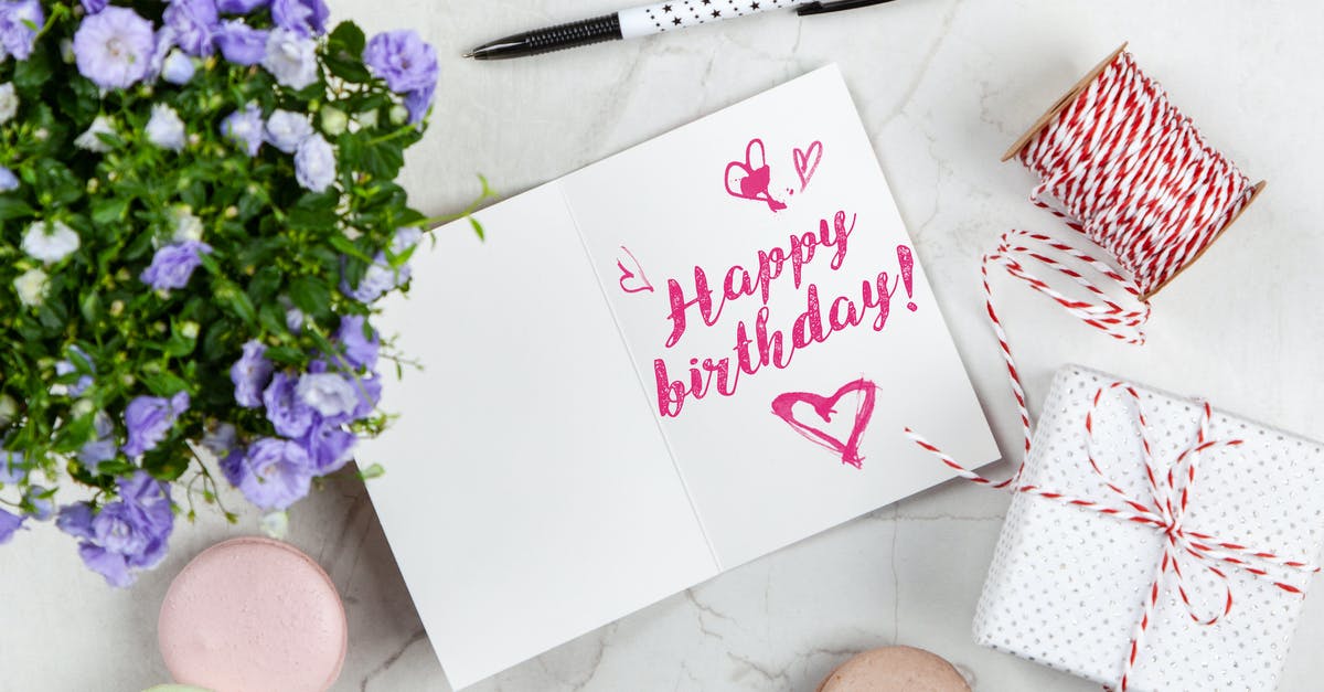 White threads on top of mushrooms? - Happy Birthday Card Beside Flower, Thread, Box, and Macaroons