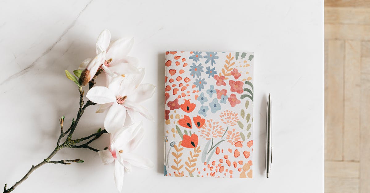 Why am i unable to season my pure iron wok? - Notebook with pen near white Magnolia flower