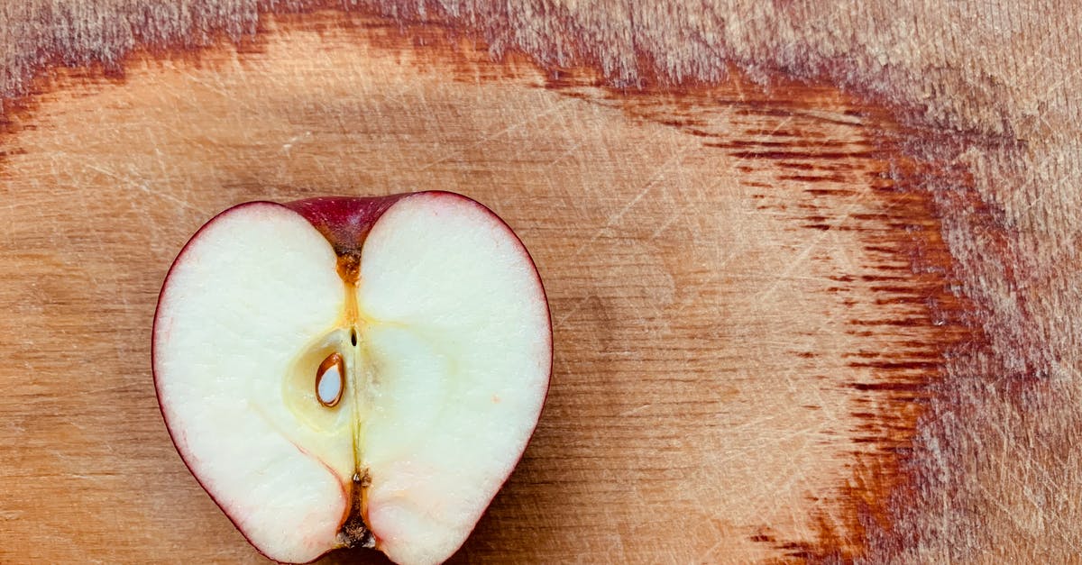 Why are my apple fritters too doughy in the center? - Sliced Apple Fruit on Brown Wooden Surface