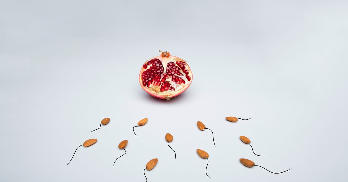 Why are my pomegranate seeds white? - Red and Brown Round Fruit