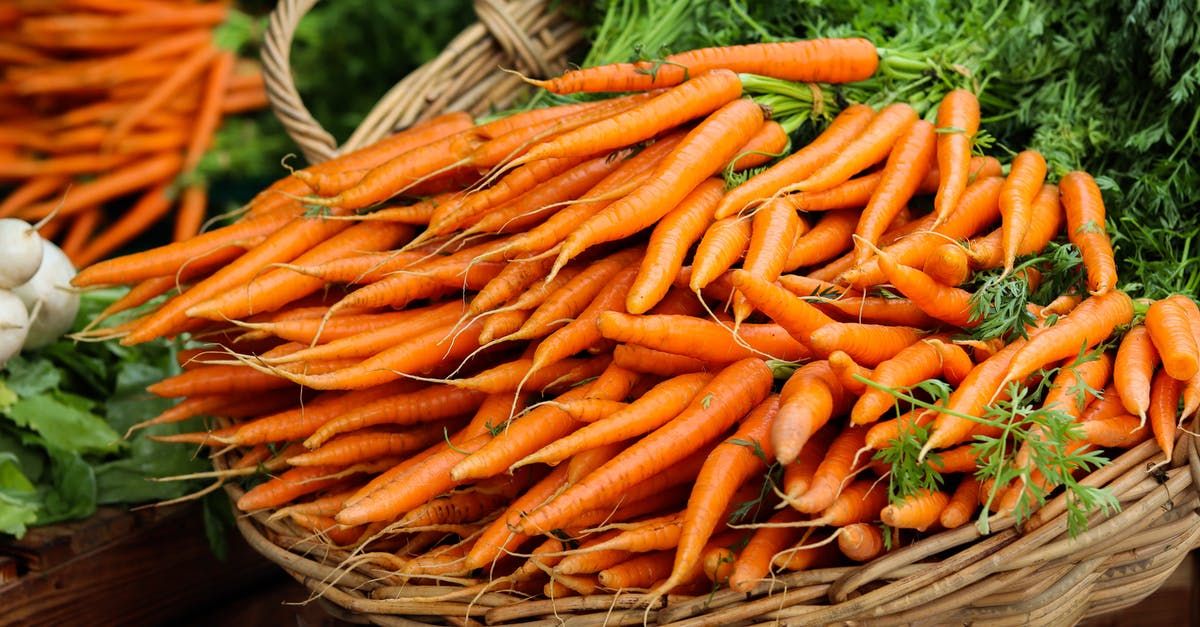 Why are non-orange coloured carrots so uncommon? - Orange Carrots on Brown Woven Basket