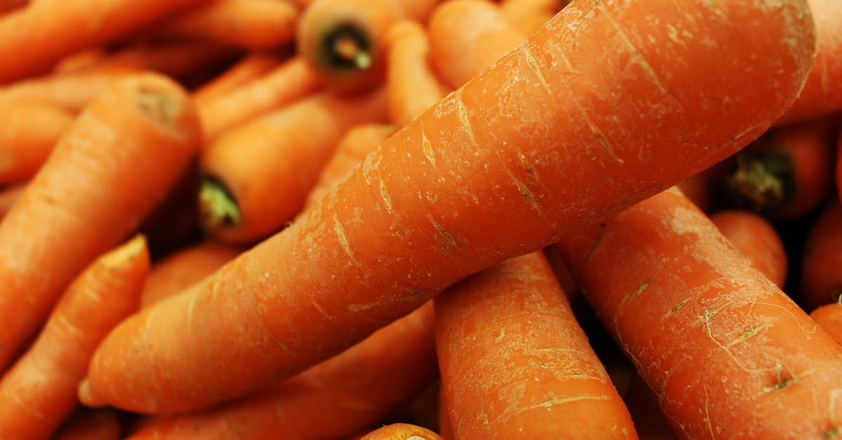 Why are non-orange coloured carrots so uncommon? - Fresh Carrots in Closeup