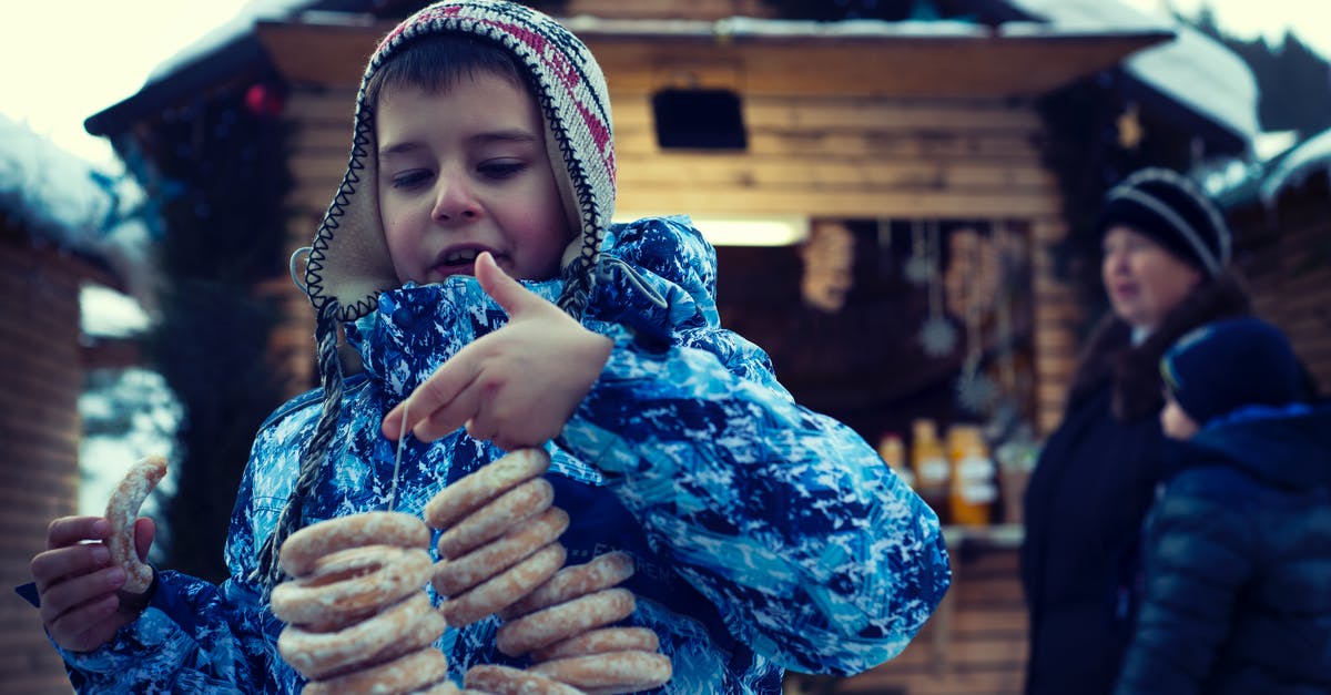 Why are these bagels sticking? - Boy Holding Doughnuts