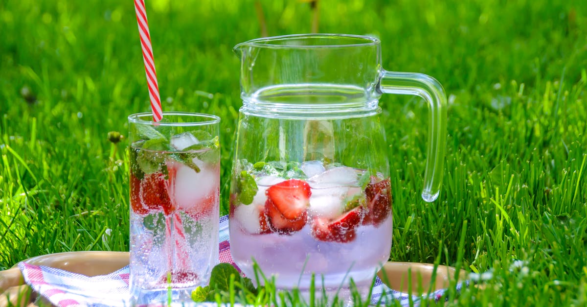 Why can food be left out to cool (140F to 40F in < 6h) but not to defrost? - Clear Glass Pitcher With Drinking Cup on Green Grass