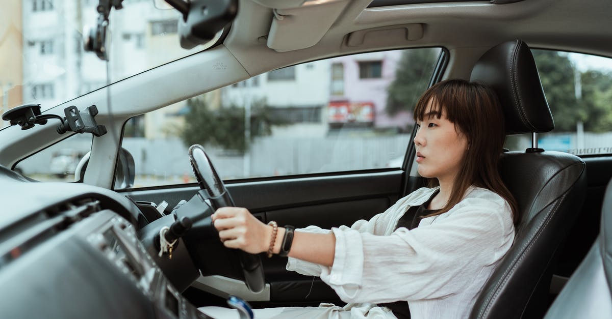 Why cool creme brulee? - Serious Asian woman driving right hand car