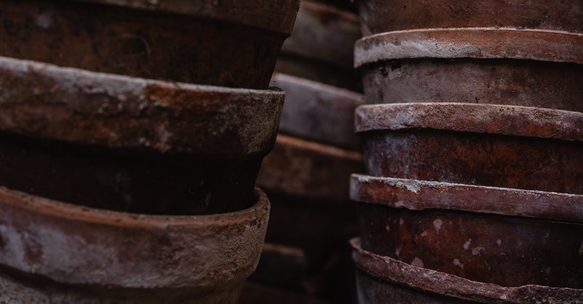 Why did my brown beef stock end up yellow? - Close Up Photo of Pile of Brown Clay Pots