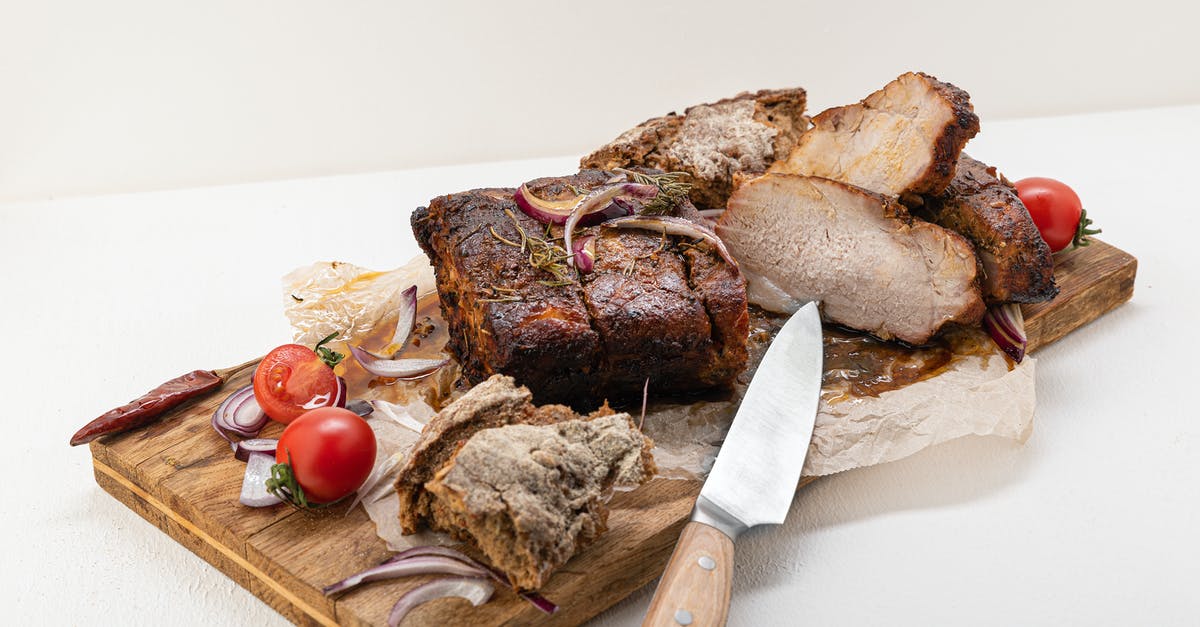 Why did pork tenderloin go pink in the fridge? - Sliced Meat on Brown Wooden Chopping Board