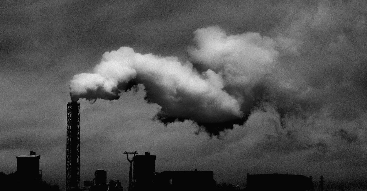 Why did this fondue become grainy and lumpy? - Monochrome Photo of Industrial Plant