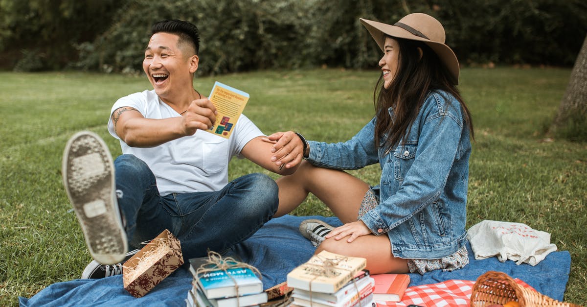 Why didn't my apples caramelise? - Man in White T-Shirt Holding a Book and Sitting Beside Woman in Hat