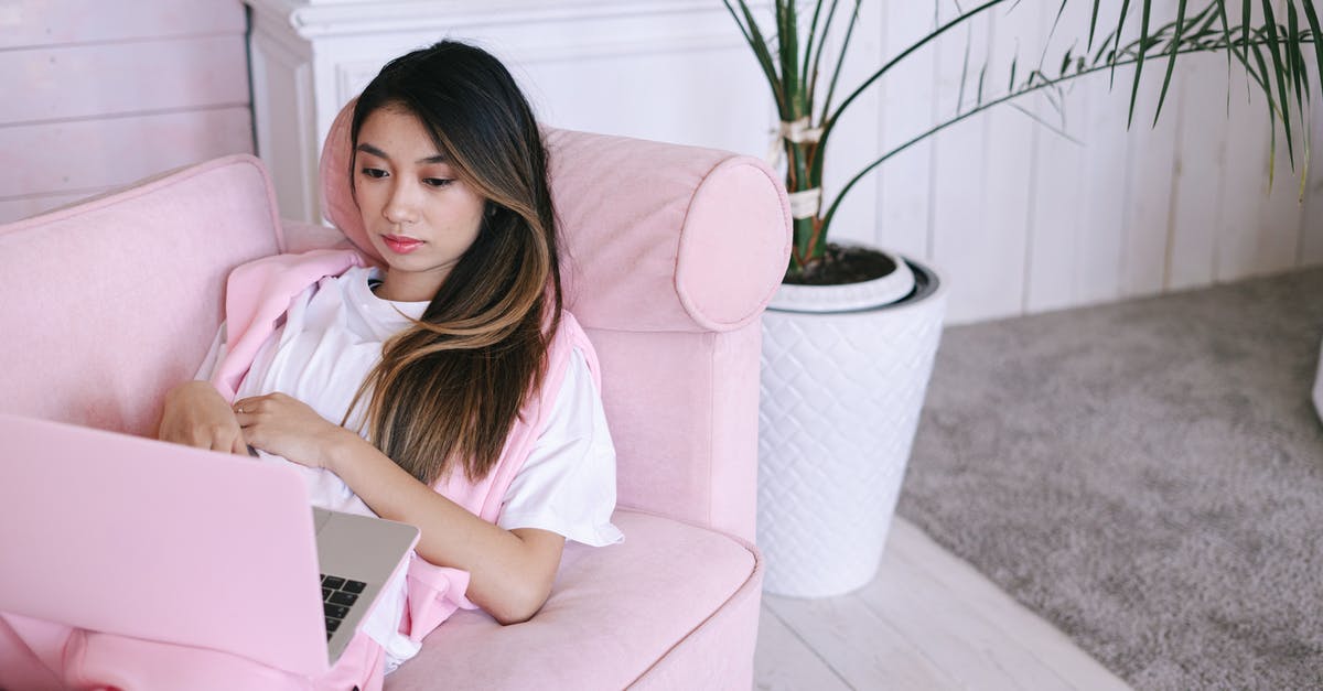 Why didn't my brioche rise? - Woman in Pink Shirt Sitting on Sofa Using Macbook