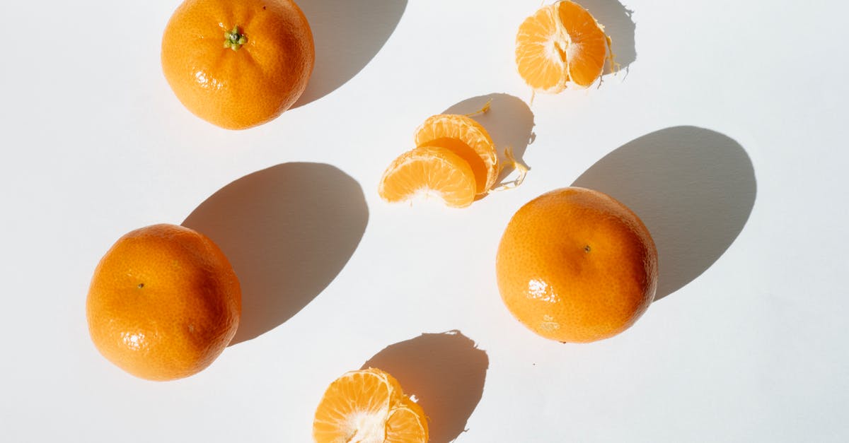 Why do fresh mandarin oranges get very bitter when baked? - Orange Fruits on White Surface