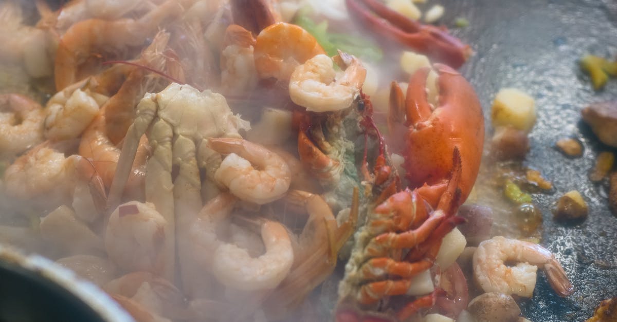 Why do shrimp / lobster / crab turn pink or red when cooking? - Shrimp Dish on White Ceramic Bowl