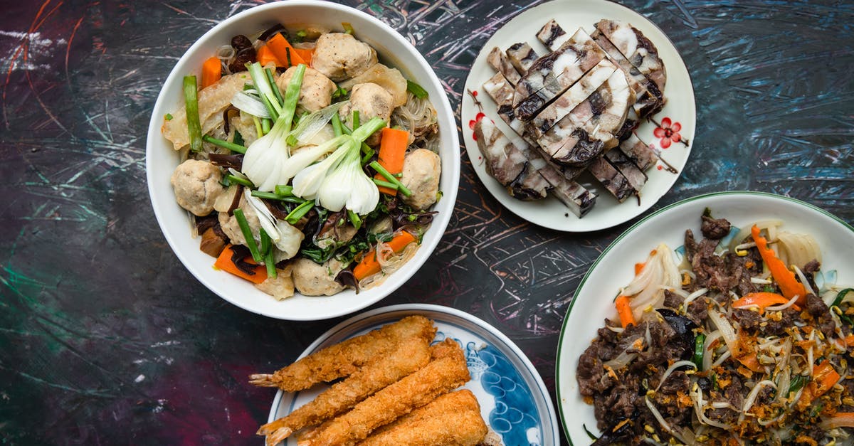 Why do Vietnamese dishes feature cut-up meat with the bone in? - Dishes on White Serving Plates
