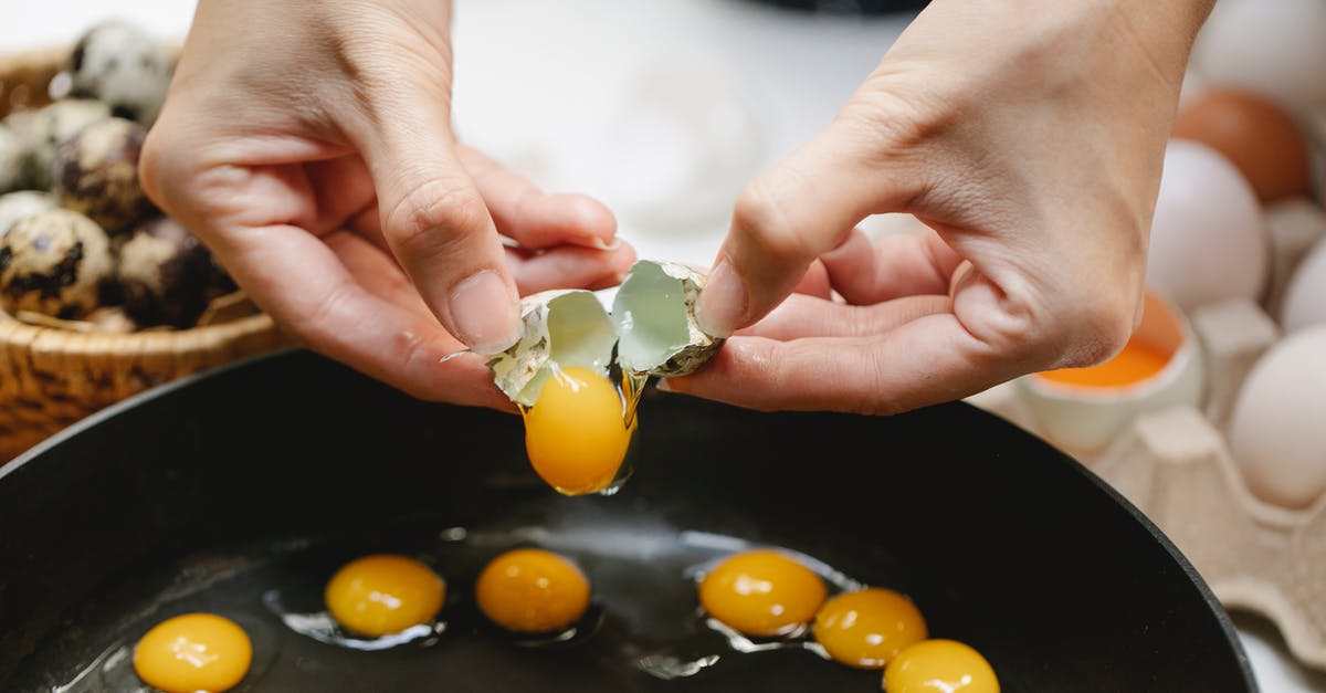 Why do yolks break so easily (sometimes)? - Crop cook breaking quail egg into frying pan