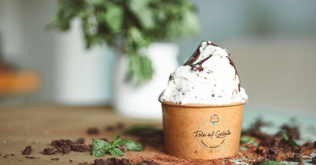 Why does food get cold faster in some locales than others? - Brown and White Coffee Cup With White Cream and Green Leaves