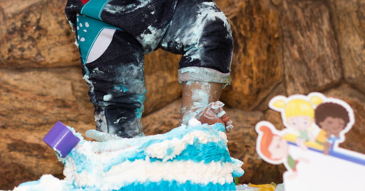 Why does food spoil in the freezer? - Faceless child pushing festive cake